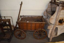 Vintage four wheeled hand cart with painted wooden body and iron mounted wheels