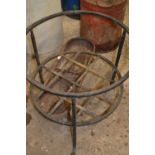 Mixed Lot: small cast iron feeder, a vintage oil drum and a circular cast iron stand (3)