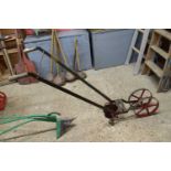 Iron framed cultivator with discs