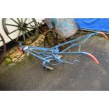 An iron framed Hunter Hoe Patent Maybole with blue and red painted frame