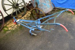 An iron framed Hunter Hoe Patent Maybole with blue and red painted frame