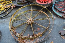 A pair of Bamfords Utoexter iron wheels, approx 132cm diameter