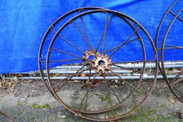 Bamfords, Utoxeter, pair of cast iron wheels, 112cm diameter