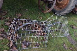 A pair of galvanised wall mounted hay racks together with a pair of iron hay racks (4)