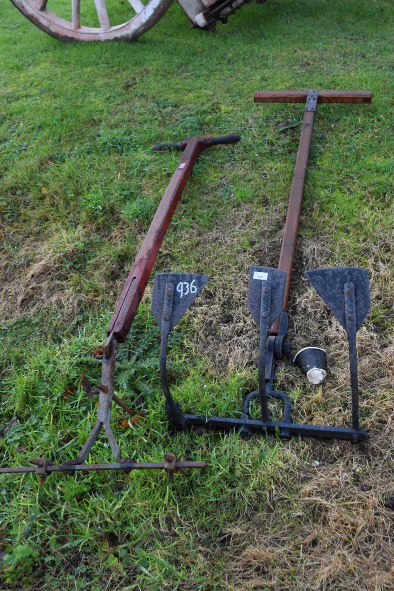 Two wood and iron framed cultivators