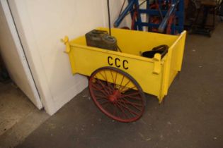 Yellow painted metal bodied Cambridge County Council street cleaner's barrow