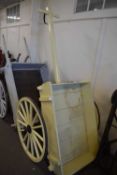 Refurbished single axle cart with cream painted body