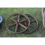 A pair of iron implement wheels, 26 inch diameter