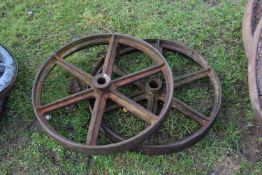 A pair of iron implement wheels, 26 inch diameter