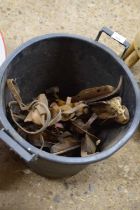 Bucket of vintage ice skates