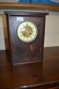 Late 19th Century mantel clock in stained wooden case