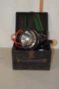 A vintage cased lamp marked AM5A/2334