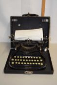 Cased folding typewriter