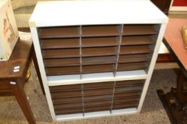A metal office filing cabinet