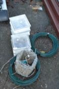 Mixed Lot: Roll of barbed wire, various rolls of green garden wire and a quantity of glass bricks