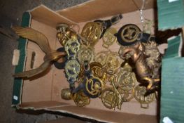 Box of various assorted horse brasses, brass eagle and a brass model of two rams