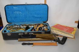 A Sterling saxophone with case together with various music books, music stand etc