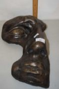A bronzed plaster abstract wall mask