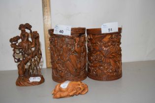 Two contemporary Chinese brush pots together with a further figure and a further carved abstract