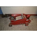 A trolley jack and an iron framed pipe cutter (2)