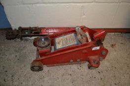 A trolley jack and an iron framed pipe cutter (2)