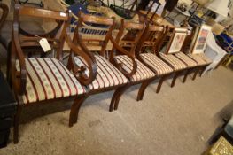 A set of eight reproduction mahogany dining chairs with brass inlay decoration