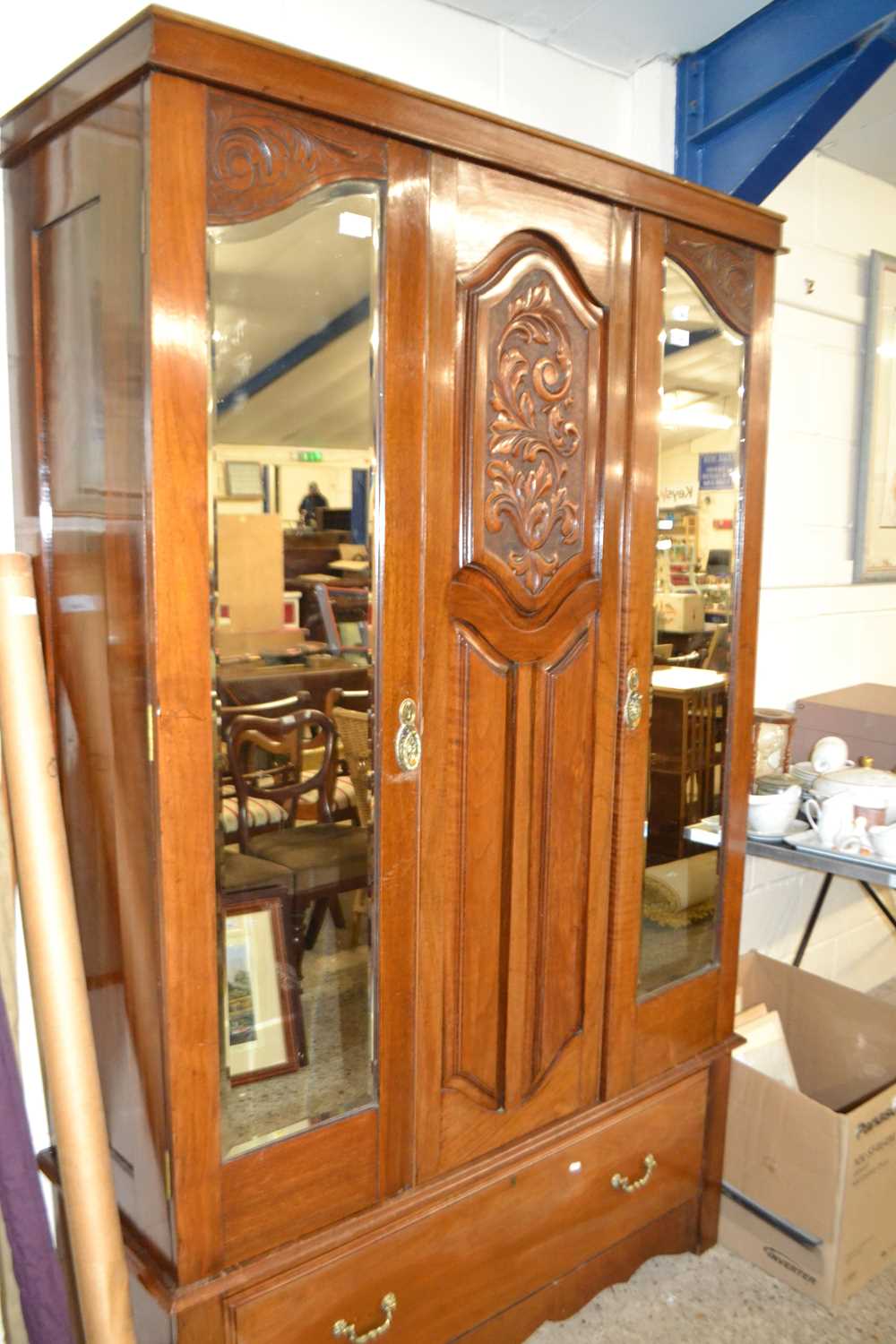 An American walnut mirror door wardrobe