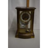 Collingwood & Sons, brass and glass cased mantel clock with brass movement striking on a coil -