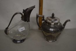 Silver plated decanter of berge formed shape together with a silver plated teapot