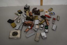 Box of various novelty lighters
