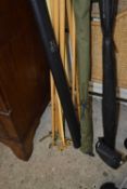 Group lot of snooker cue rests and fishing rods plus a further Riley snooker cue