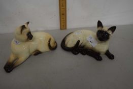 A Beswick and a Royal Doulton model Siamese cats (2)