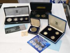 Quantity of four cased silver proof sets to include 2003 Royal Mint, Britannia Collection, Royal