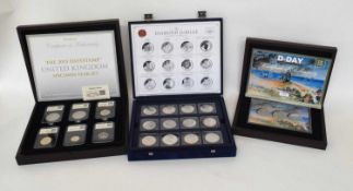 Three cases of commemorative coins by Westminster, date stamped to include 70th Anniversary