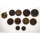 A quantity of eleven, mainly Victorian tokens to include Guernsey, four doubles, 1864, 1874 and