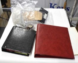 Two folders of mixed British and foreign coins together with further quantity of modern European