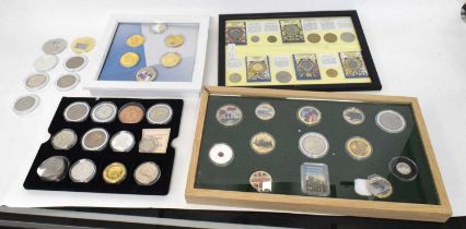 Three frames and trays of modern commemorative Elizabeth II coins and replica hand hammered coins