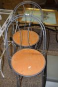 A pair of aluminium framed bistro chairs