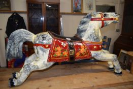 A vintage painted wooden carousel type horse