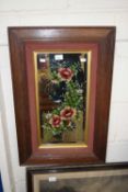 A floral painted wall mirror, framed