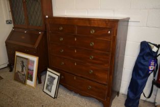A large Georgian mahogany six drawer chest with ringlet handles