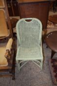 Green painted wicker chair