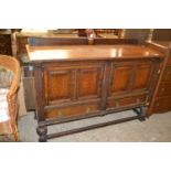 Oak two door, two drawer sideboard