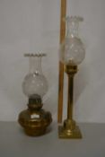 Brass based oil lamp and a similar candlestand