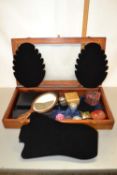 Table top display case containing various assorted small trinket boxes, hand mirror and other items