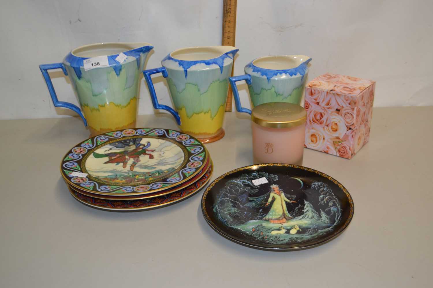 A graduated set of three Hancocks ivy ware jugs together with various collectors plates and other