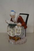 Continental porcelain model of a lady reading