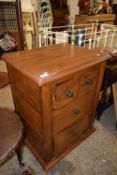 A modern hardwood four drawer chest