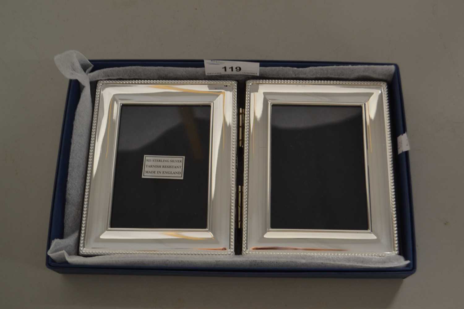 Small modern silver mounted hardwood double picture frame