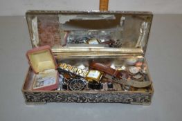 Small silver plated box containing various assorted coinage, silver necklace, wristwatches etc